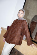 NOIRA blouse in brown.