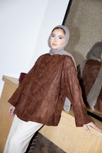 NOIRA blouse in brown.
