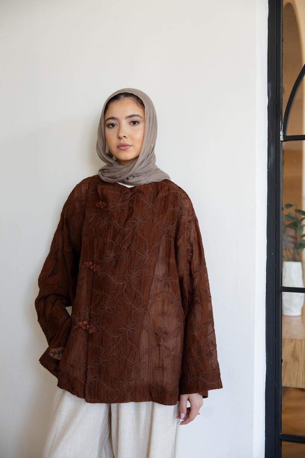 NOIRA blouse in brown.