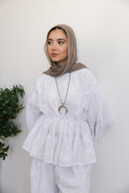FLOWRA set in white.