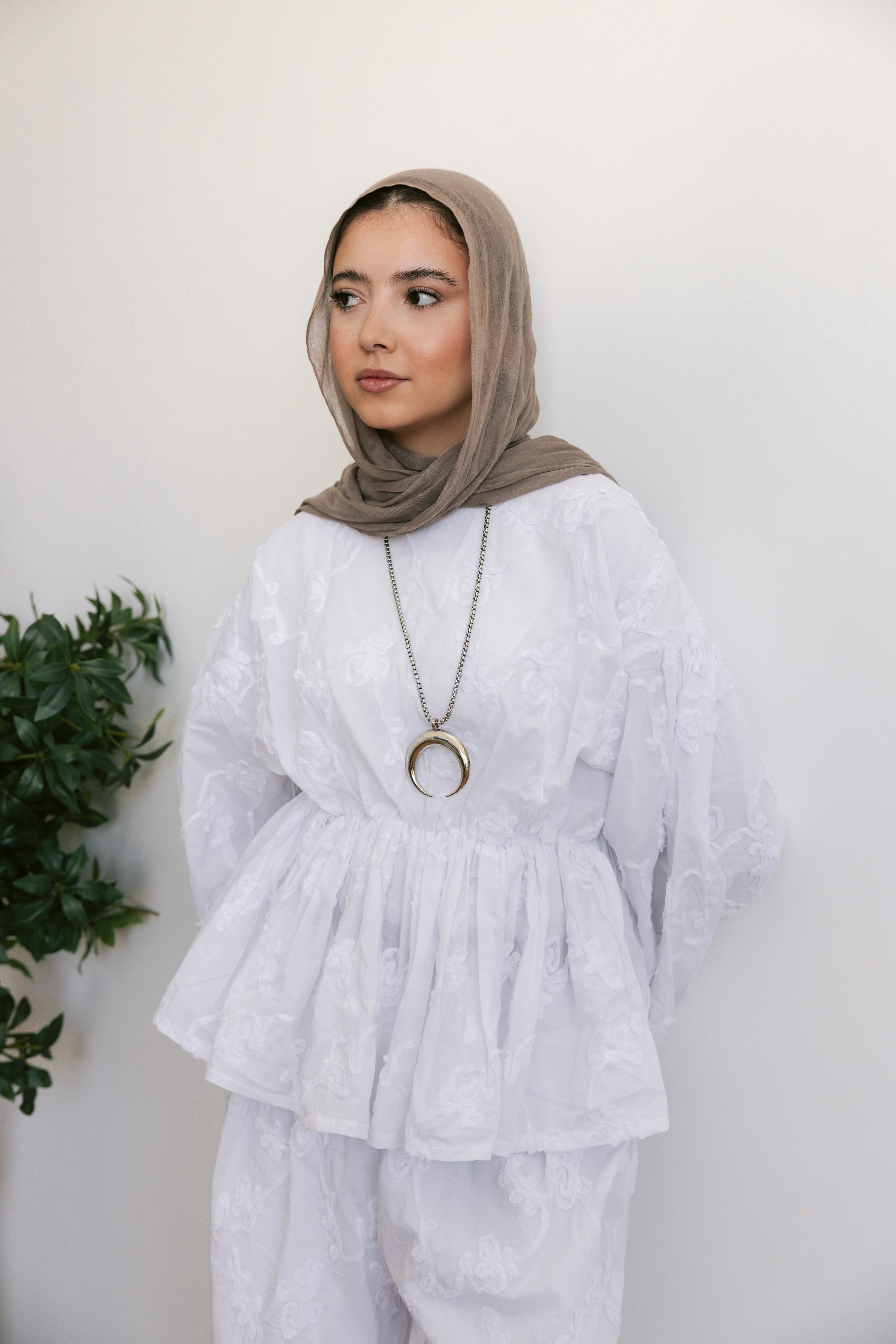 FLOWRA set in white.