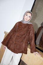 NOIRA blouse in brown.