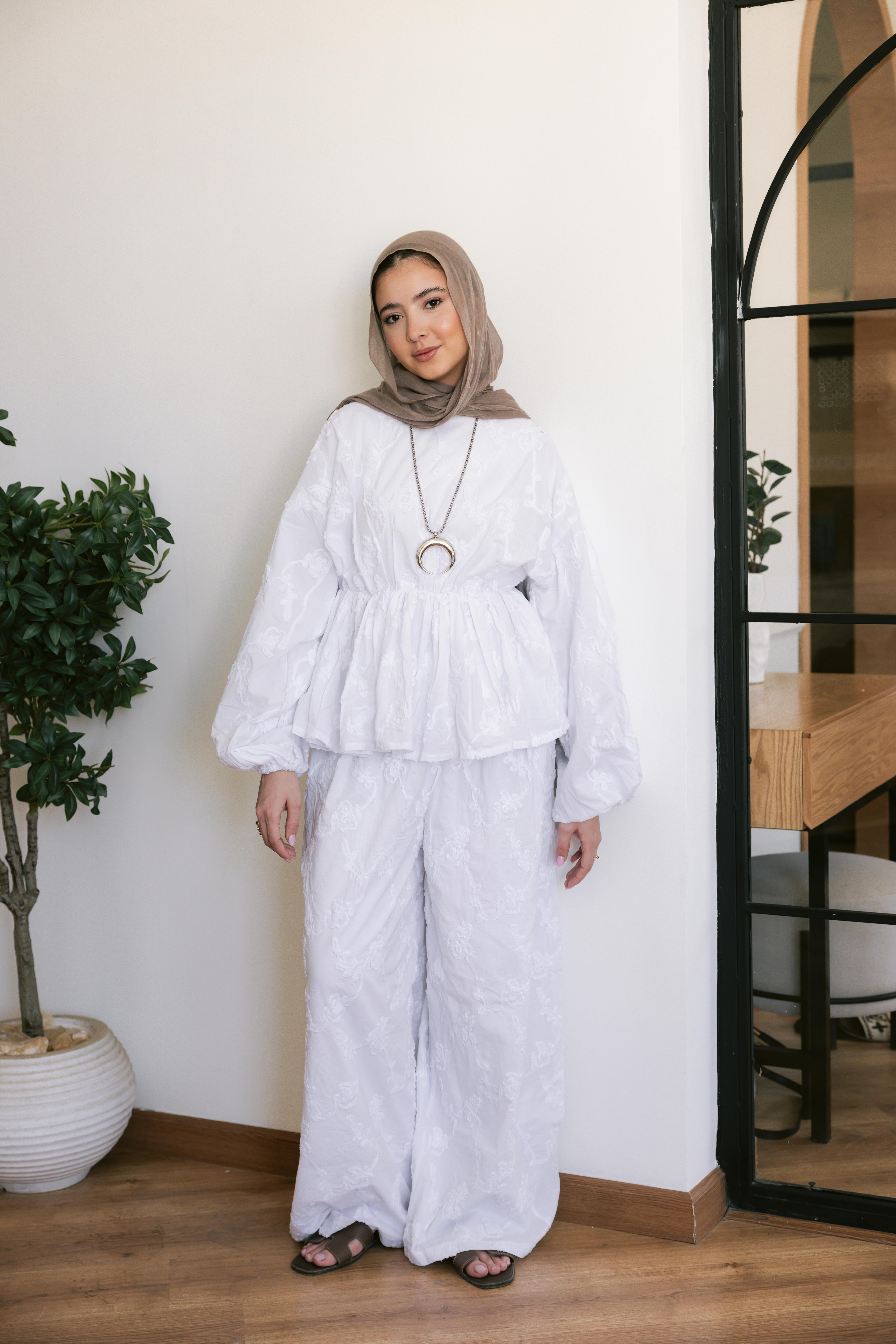 FLOWRA set in white.