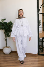 FLOWRA set in white.