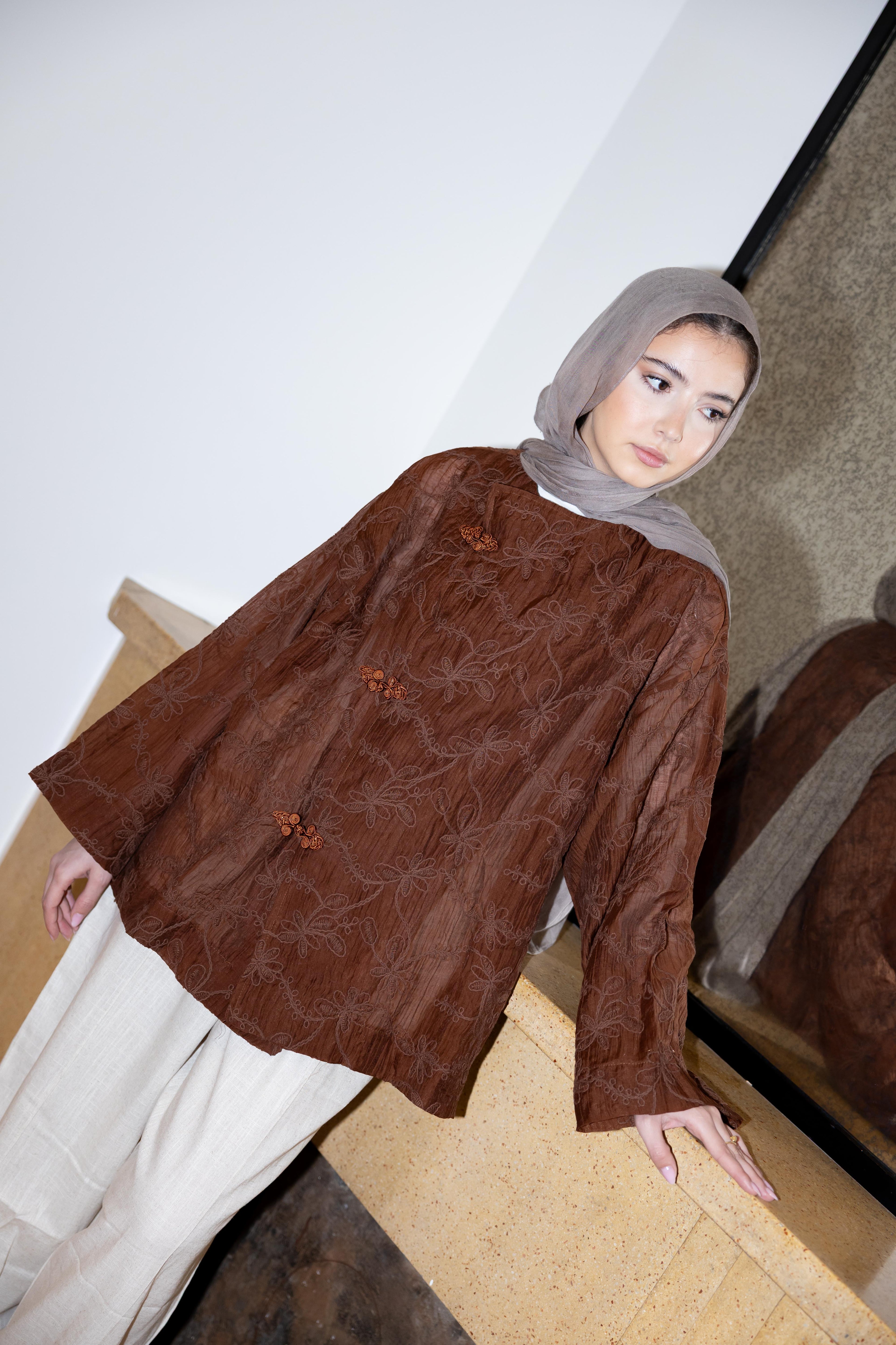 NOIRA blouse in brown.