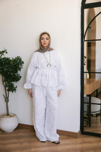 FLOWRA set in white.