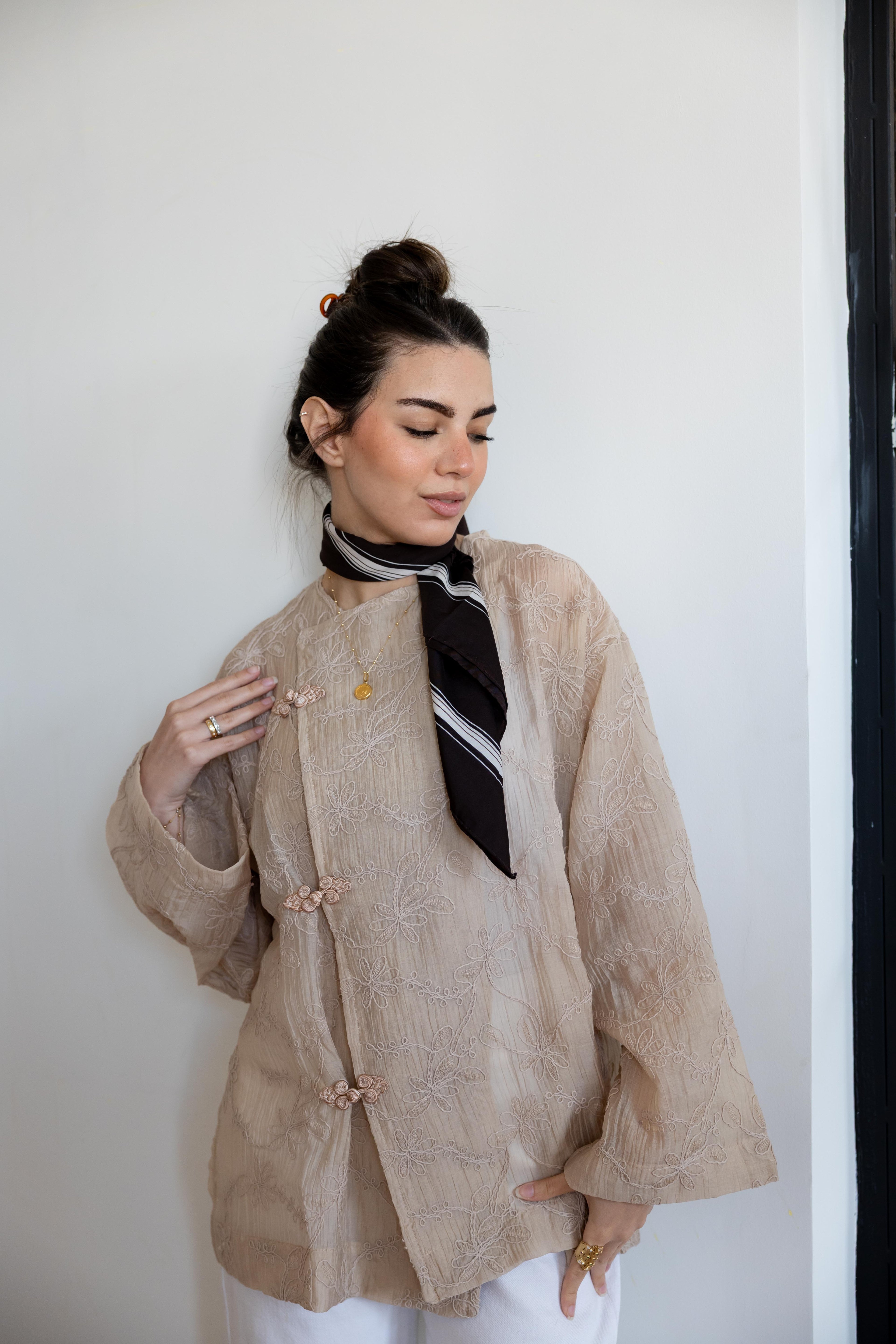 NOIRA blouse in beige .
